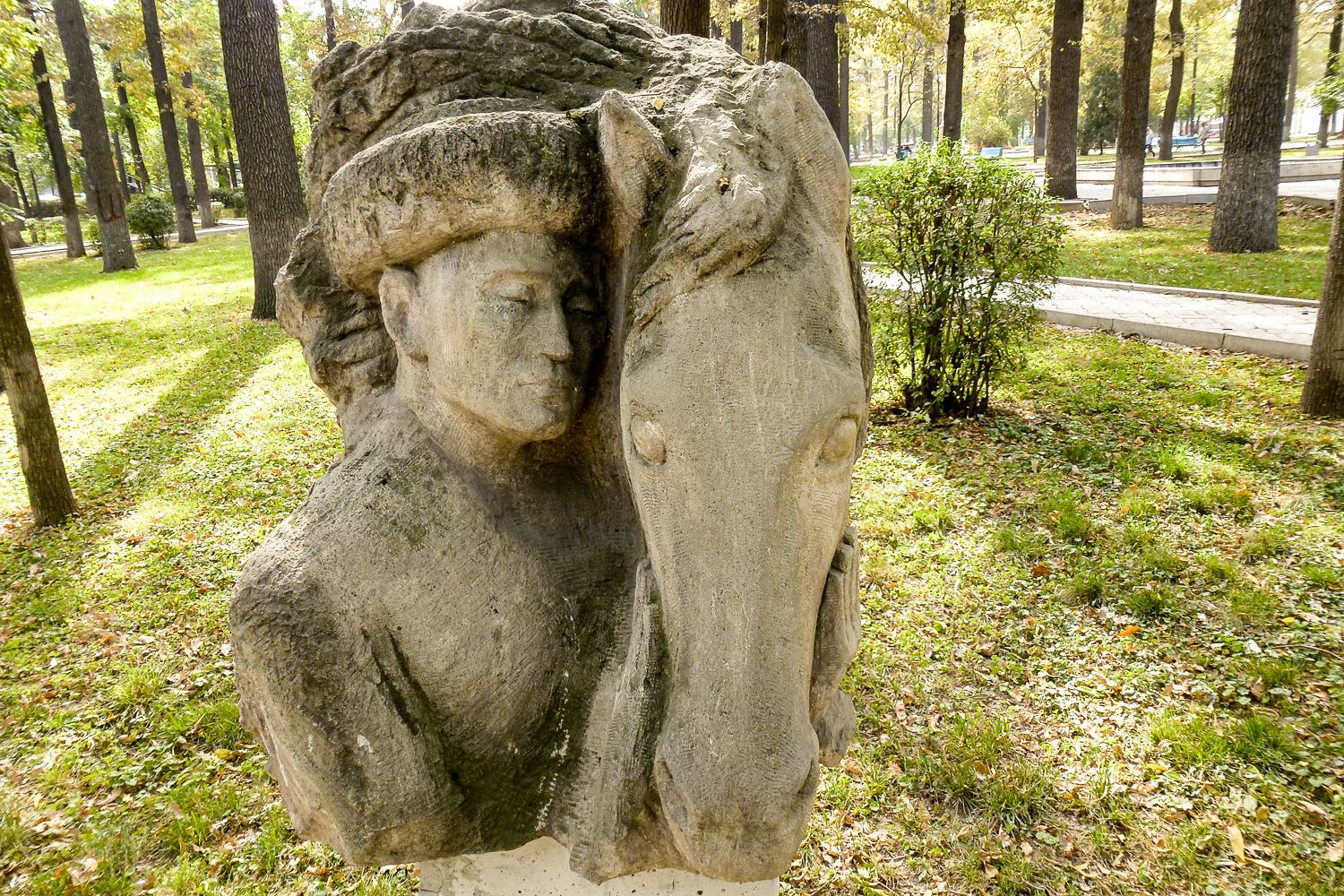 nomad with his horse sculpture in oak park in Bishkek City Tour