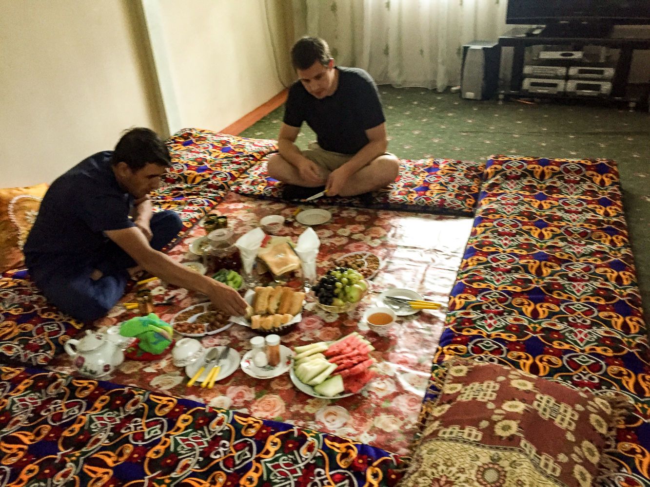 Tourists eating at dastarkhan in Central Asia