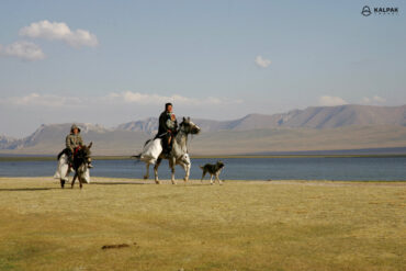 people on horses in Kyrgyzstan