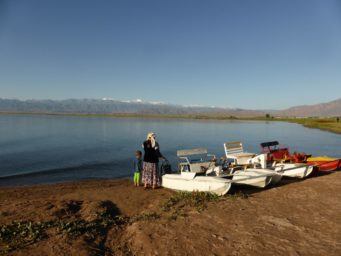 issyk kul lake Kyrgyz people walking at the shore
